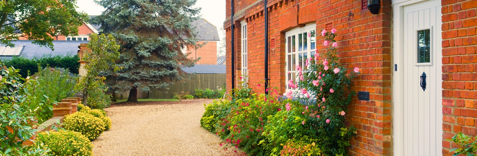 UK house in spring with flowers
