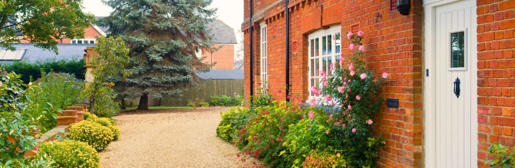 UK house in spring with flowers